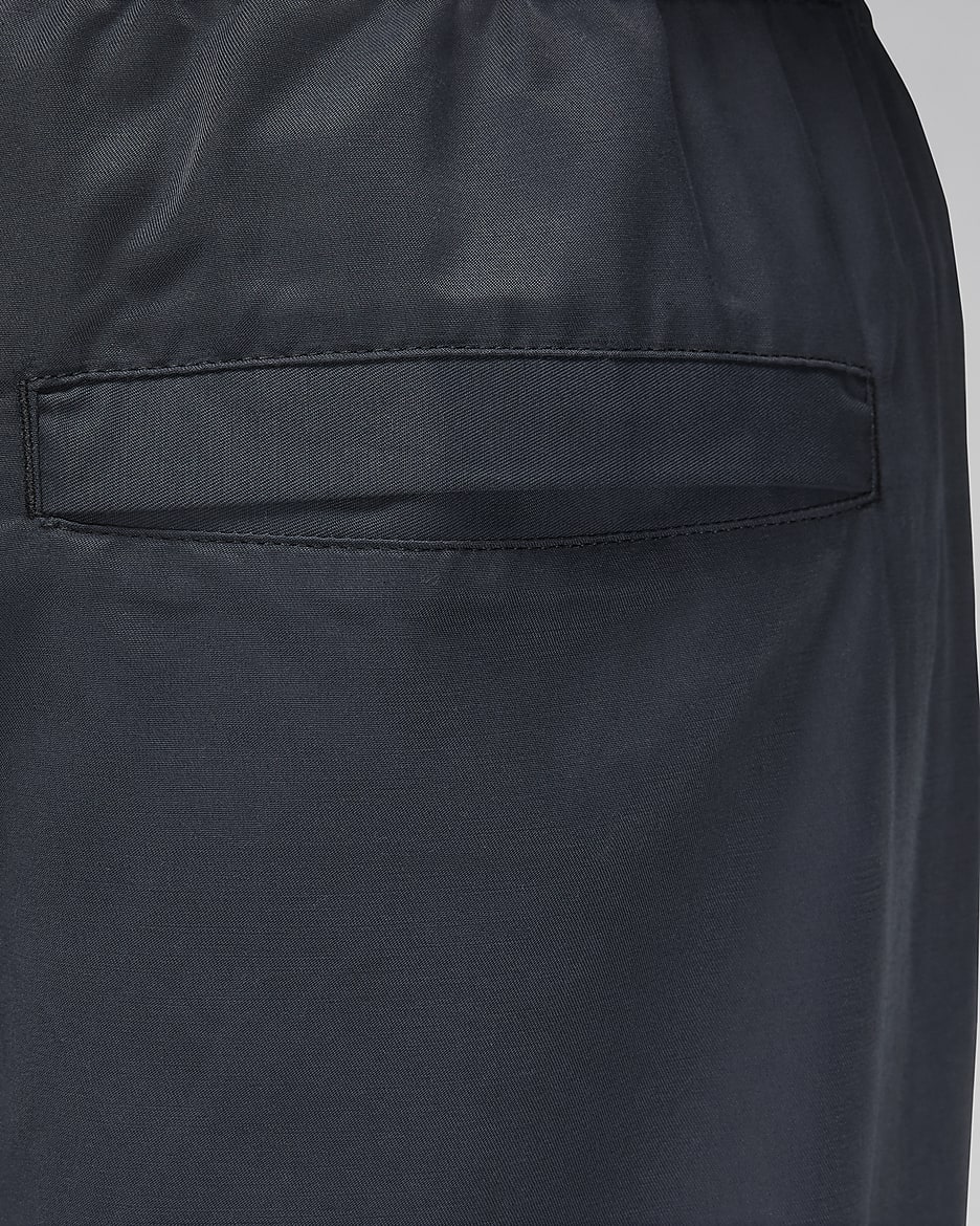 Nike woven core track pants best sale